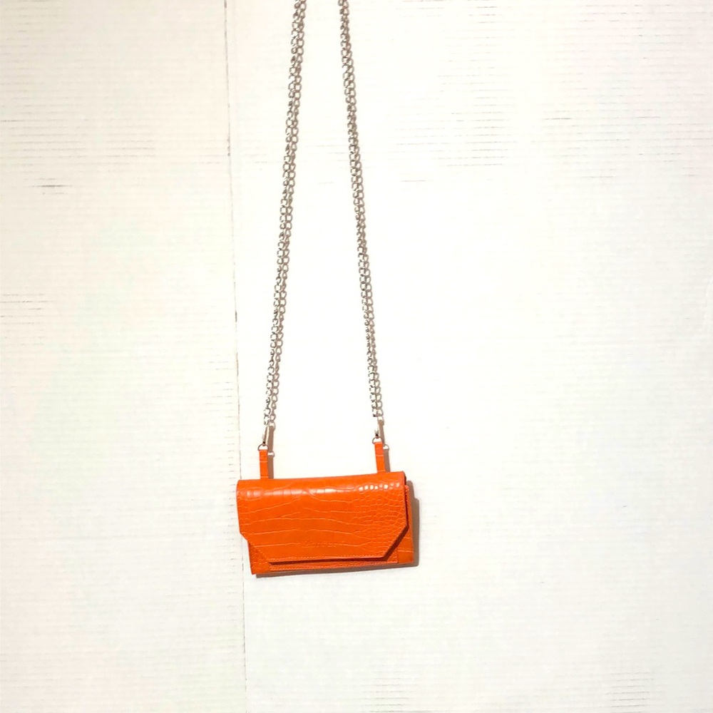 Cute small cross body w/ gold metal chain strap or belt look strap Soft orange.